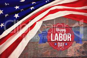 Composite image of happy labor day text in banner