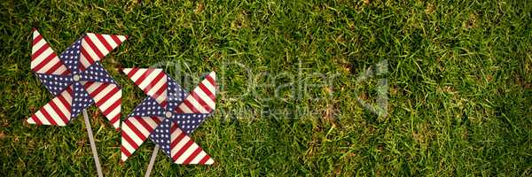 Composite image of 3d image of pinwheel toy with american flag pattern