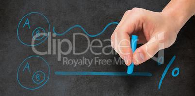 Composite image of hand writing with a chalk