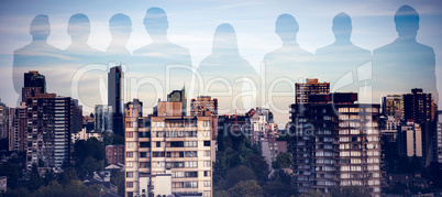 Composite image of business people standing over white background