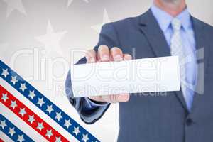Composite image of midsection of businessman holding blank card