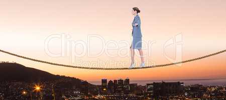 Composite image of businesswoman walking with arms outstretched over white background