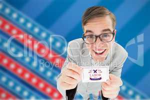 Composite image of geeky hipster smiling and showing card