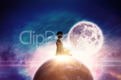 Composite image of side view of person practicing meditation