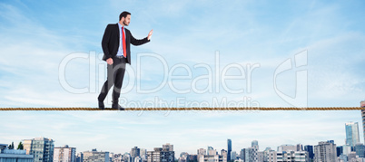 Composite image of businessman walking and presenting with hands