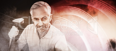 Composite image of man holding a golf club