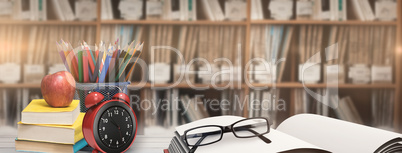 Composite image of school supplies on desk