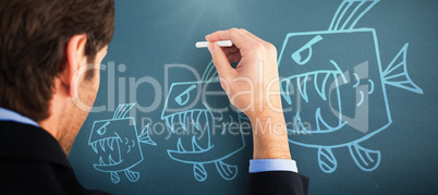 Composite image of businessman writing with a white chalk