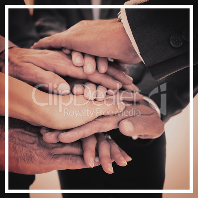 Business team stacking hands together