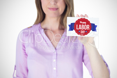 Composite image of portrait of beautiful businesswoman showing blank sign