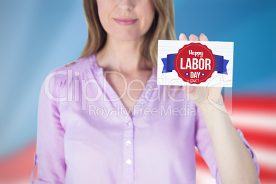 Composite image of portrait of beautiful businesswoman showing blank sign