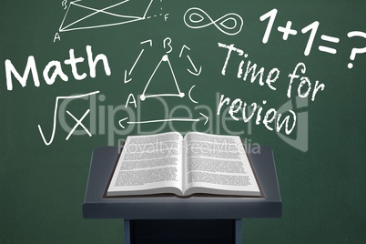 Book on speech table against green blackboard with education and school graphics