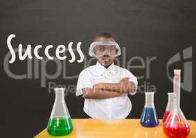 Student boy at table against grey blackboard with success text