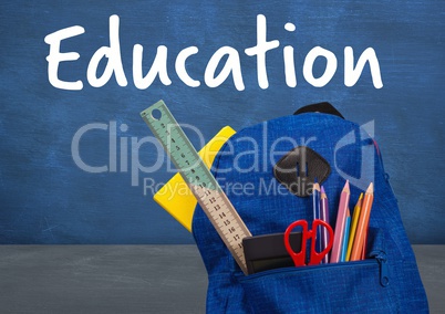 Schoolbag on Desk foreground with blackboard education text