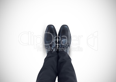 Black shoes on feet with white background