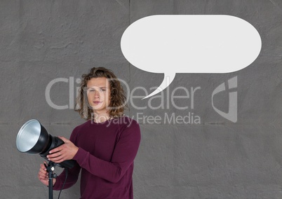 Photographer man with speech bubble against grey background