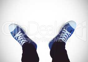 Blue shoes on feet with white background