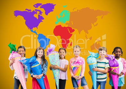 Kids holding cones in front of colorful world map