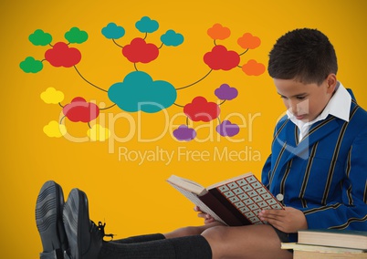 Boy reading in front of colorful clouds on yellow background