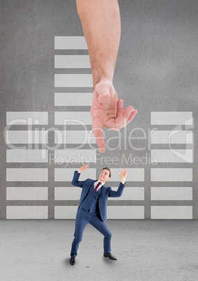 Hand pointing at scared business man against grey background with infographics