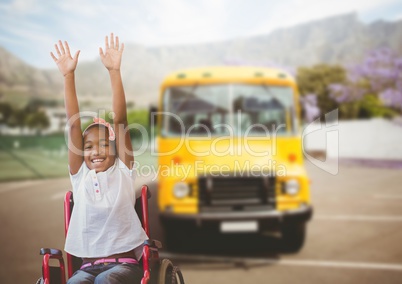 Disabled girl in wheelchair in front of school bus