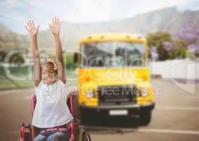 Disabled girl in wheelchair in front of school bus