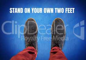 Stand on your own two feet text and Grey shoes on feet with blue background