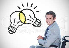 Disabled man in wheelchair with light bulbs clashing graphics