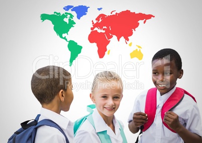 School kids laughing in front of colorful world map