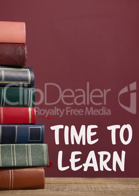 Books on the table against red blackboard with time to learn text