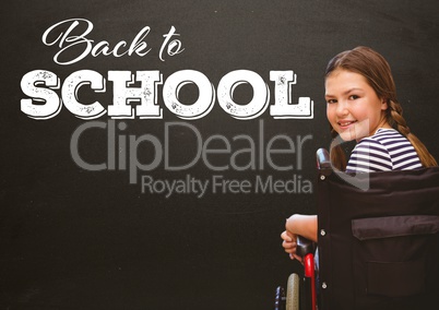 Back to school text on blackboard with disabled girl in wheelchair