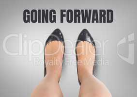 Going forward text and Black shoes on feet Blue shoes on feet with grey background