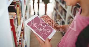 Girl holding a tablet with school icons on screen