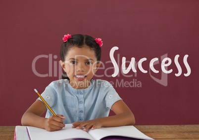 Student girl at table against red blackboard with success text