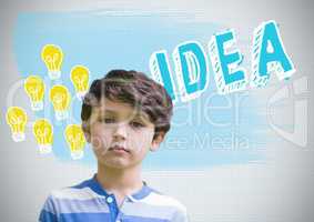 Boy in front of colorful idea and light bulb graphics