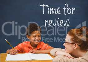 Student boy and teacher at table against blue blackboard with time for review text