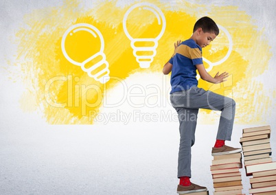 Boy climbing book tower steps with light bulb graphics