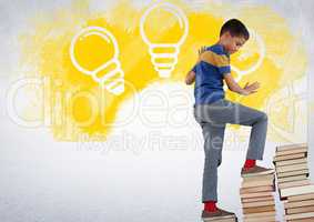 Boy climbing book tower steps with light bulb graphics