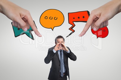Hands pointing at business man against white background with icons