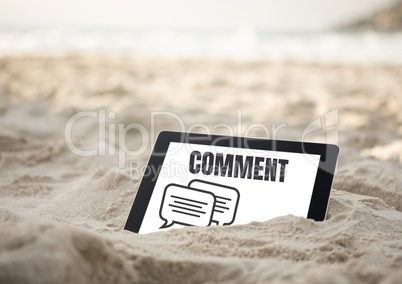 Comment text and chat graphic on tablet screen in sand on beach