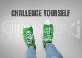 Challenge yourself text and Green shoes on feet with grey background