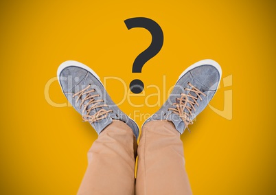 Question mark and Grey shoes on feet with yellow background