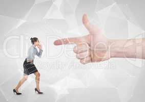 Hand pointing at angry business woman against white background