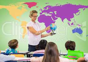 Kids in class with teacher holding globe in front of colorful world map
