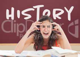 Angry student girl at table against red blackboard with history text