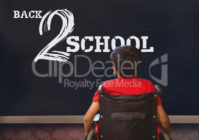 Back 2 school text on blackboard with disabled boy in wheelchair