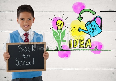 boy holding blackboard with back to school and idea colorful graphics