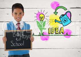boy holding blackboard with back to school and idea colorful graphics
