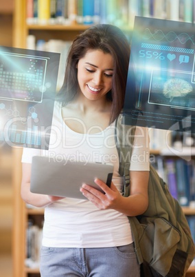 Female Student studying with tablet and science education interface graphics overlay