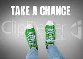 Take a chance text and Green shoes on feet with grey background